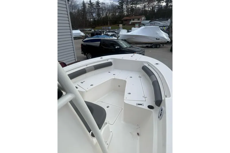Slide: The Image of 2023 Sea Born LX22 Center Console boat with spacious seating and sleek design. - 15