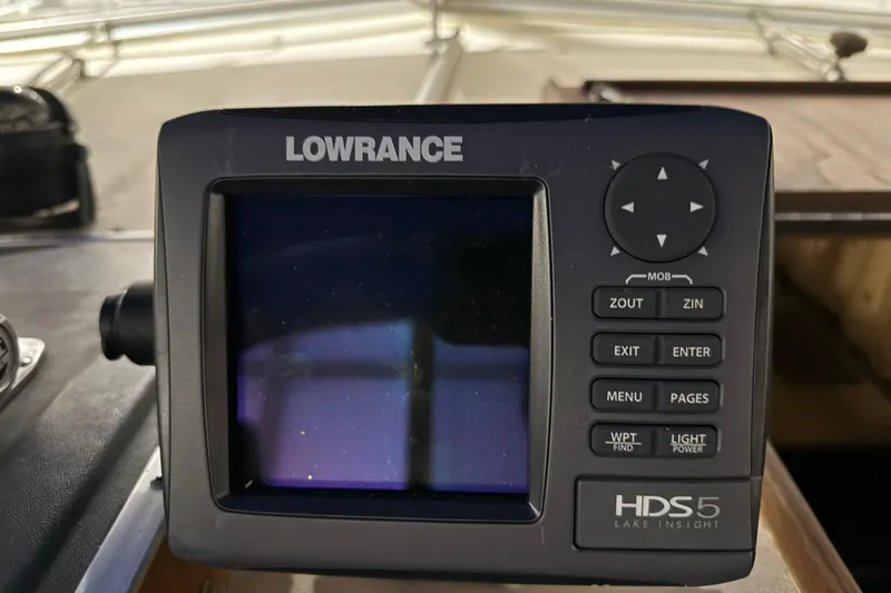 Slide: The Image of Lowrance HDS5 marine GPS unit on 1979 Chris-Craft 350 Catalina boat dashboard. - 10