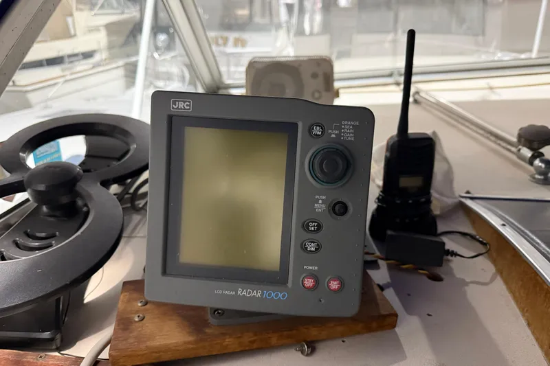 Slide: The Image of Radar system and controls on a 1979 Chris-Craft 350 Catalina boat. - 16