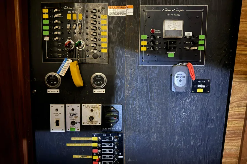 Slide: The Image of Electrical control panel of a 1979 Chris-Craft 350 Catalina boat. - 18