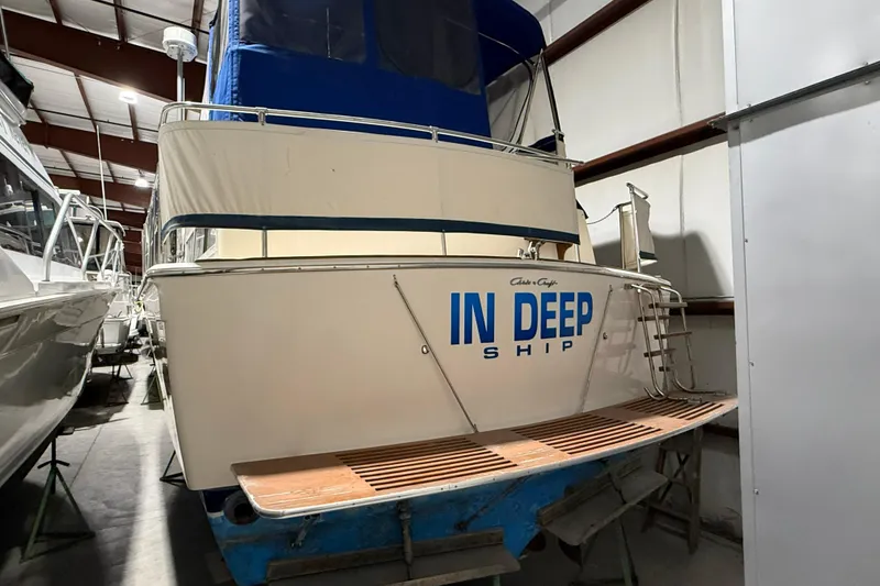 Slide: The Image of 1979 Chris-Craft 350 Catalina boat named "In Deep Ship" in storage facility. - 32