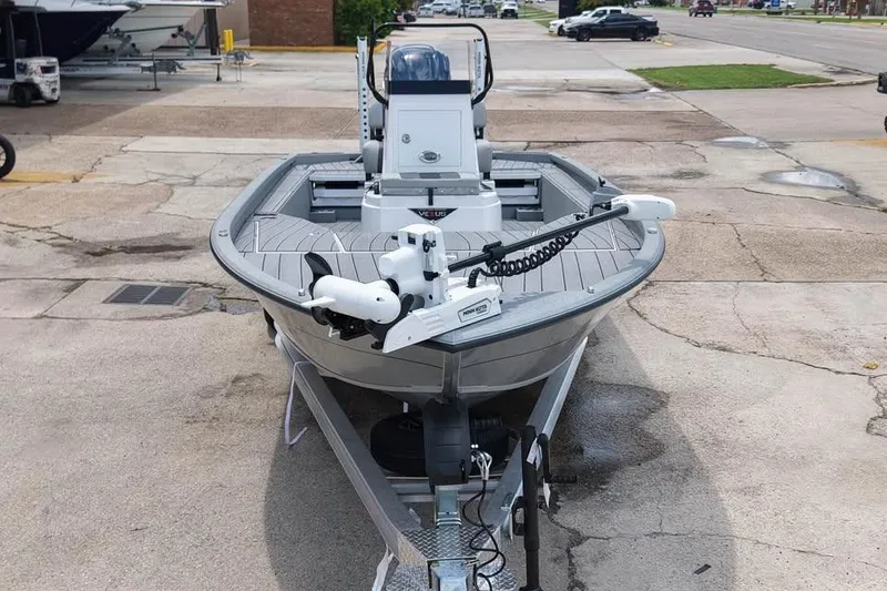 Slide: The Image of 2026 Vexus ACX 2210 boat on trailer, front view in parking lot. - 5