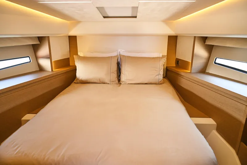 Slide: The Image of Luxurious bedroom interior of 2020 Prestige 460S yacht with modern design and ambient lighting. - 20