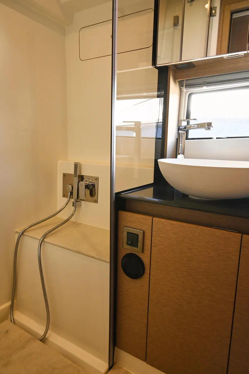 Slide: The Image of Modern bathroom in 2020 Prestige 460S yacht with sleek fixtures and elegant design. - 21