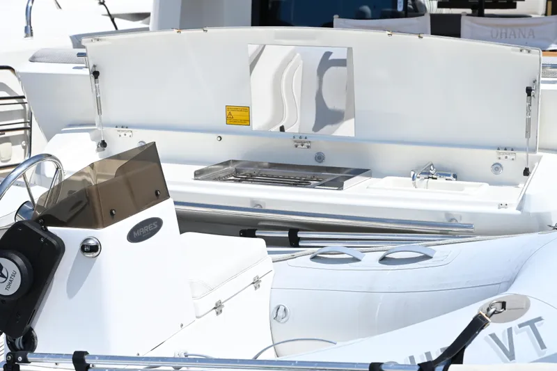 Slide: The Image of Luxury yacht Prestige 460S 2020 model with sleek outdoor kitchen setup. - 26