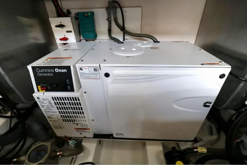 Slide: The Image of Cummins Onan generator in a 2020 Prestige 460S yacht engine room. - 28