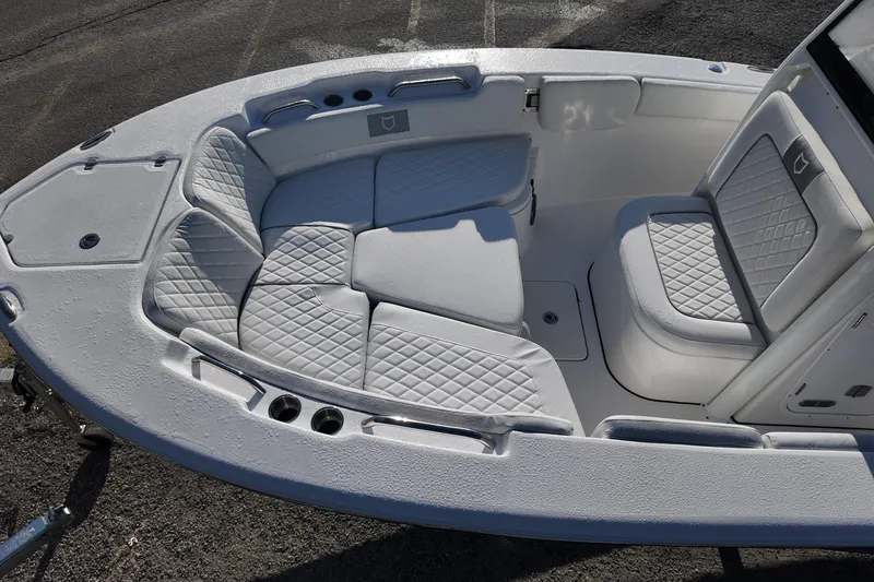 Slide: The Image of 2026 Sea Fox 248 Commander boat interior with cushioned seating and modern design. - 17