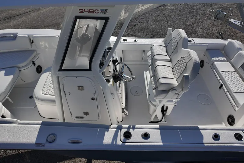 Slide: The Image of 2026 Sea Fox 248 Commander boat interior with dual seats and steering console. - 18