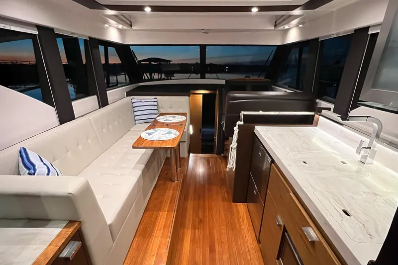 Slide: The Image of Luxurious interior of 2017 Tiara Yachts C39 Coupe with elegant seating and modern kitchen. - 8