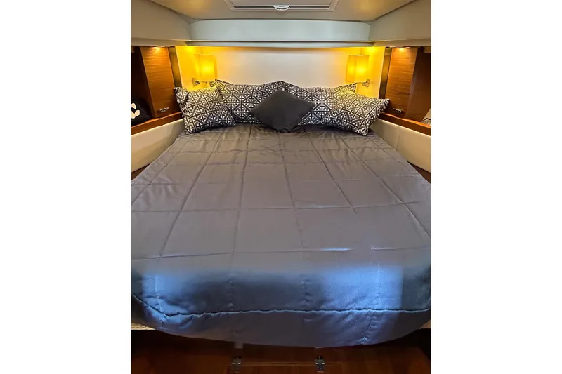 Slide: The Image of Luxurious bedroom interior of 2017 Tiara Yachts C39 Coupe with elegant bedding. - 18