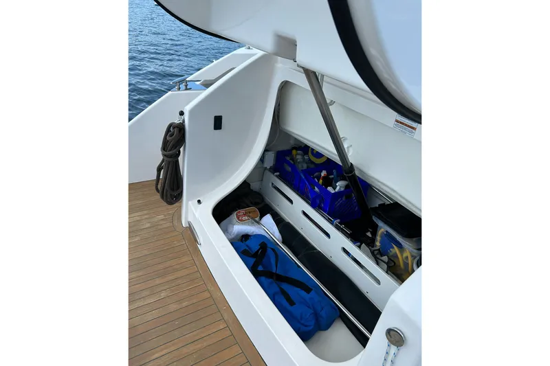 Slide: The Image of Storage compartment on 2017 Tiara Yachts C39 Coupe, featuring organized boating essentials. - 6