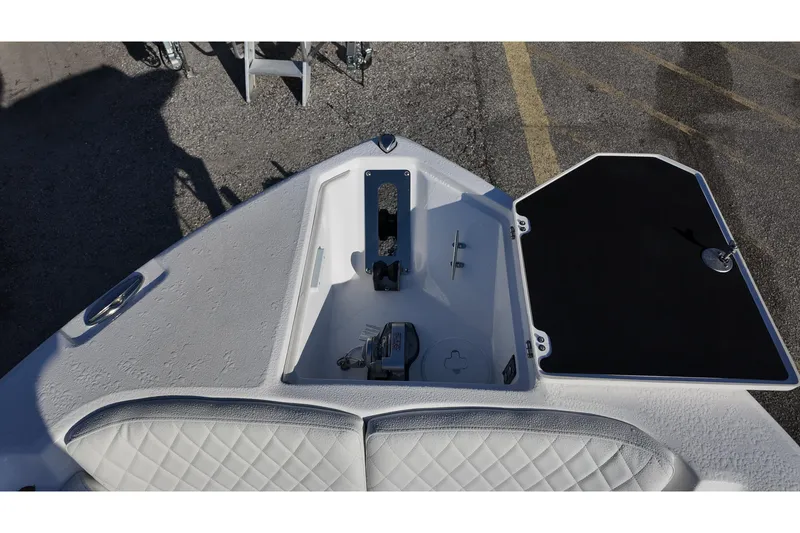 Slide: The Image of Bow view of 2026 Sea Fox 268 Commander boat with open storage compartment. - 11
