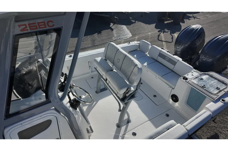 Slide: The Image of 2026 Sea Fox 268 Commander boat interior with dual engines and seating area. - 15