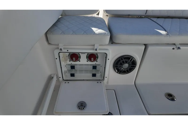 Slide: The Image of 2026 Sea Fox 268 Commander boat interior with storage compartment and speaker. - 17