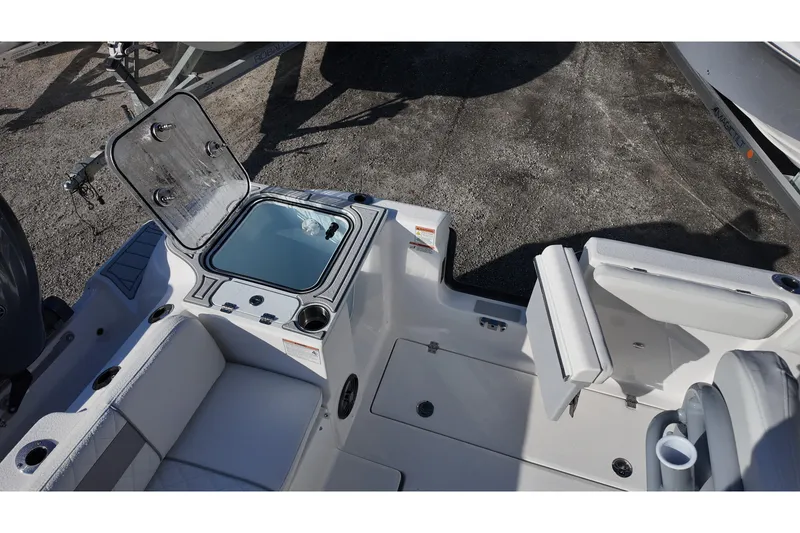 Slide: The Image of 2026 Sea Fox 268 Commander boat interior with open storage compartment and seating. - 19