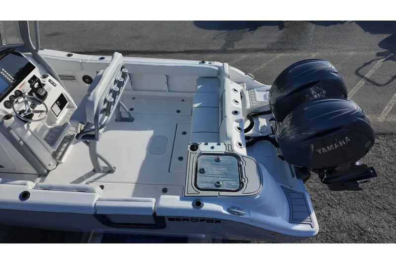 Slide: The Image of 2026 Sea Fox 268 Commander boat with dual Yamaha engines, spacious deck, and modern controls. - 24
