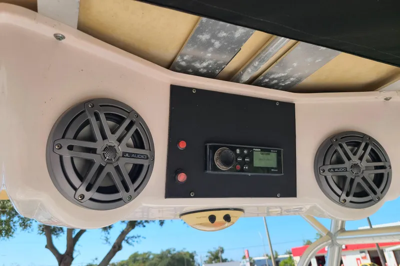 Slide: The Image of 2005 Pro-Line 24 Sport boat audio system with JL Audio speakers and Fusion stereo. - 20