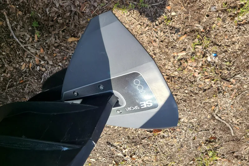 Slide: The Image of Pro-Line 24 Sport 2005 boat part on ground, featuring SE Sport 300 fin. - 31