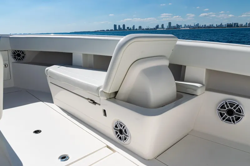 Slide: The Image of 2024 SeaVee 390B boat interior with seating and ocean view. - 12