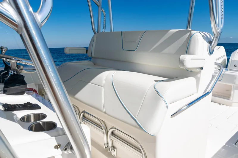 Slide: The Image of 2024 SeaVee 390B boat interior with white seating and ocean view. - 29