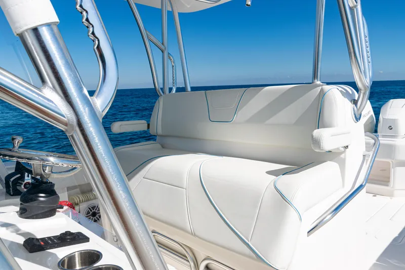 Slide: The Image of 2024 SeaVee 390B boat interior with white seating and stainless steel accents. - 30