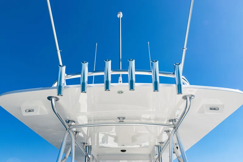 Slide: The Image of 2024 SeaVee 390B boat tower against clear blue sky. - 50