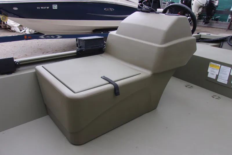 Slide: The Image of 2022 Tracker Grizzly 1648 MVX SC boat seat and storage compartment. - 10