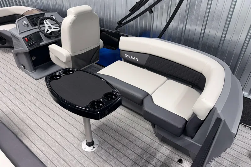 Slide: The Image of Interior of 2026 Sylvan R-20 LZ DH boat with seating and steering console. - 14