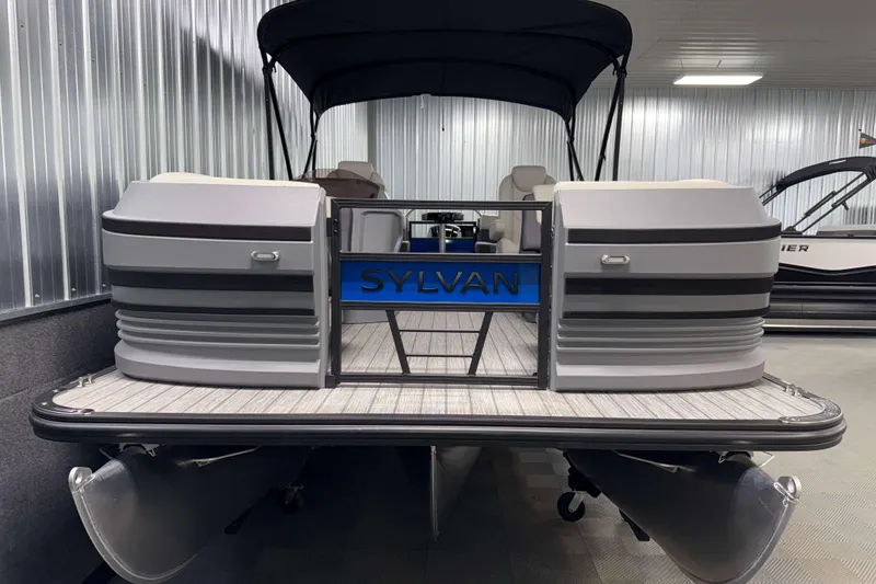 Slide: The Image of 2026 Sylvan R-20 LZ DH pontoon boat in showroom, featuring sleek design and modern amenities. - 18