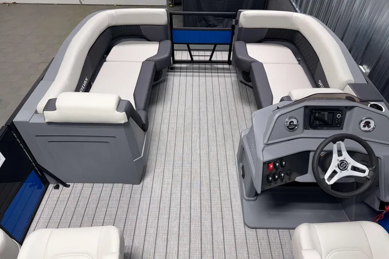 Slide: The Image of 2026 Sylvan R-20 LZ DH pontoon boat interior with modern seating and helm. - 5