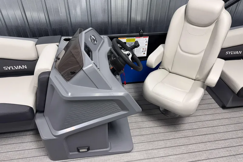 Slide: The Image of Interior of 2026 Sylvan R-20 LZ DH boat with modern helm and comfortable seating. - 7