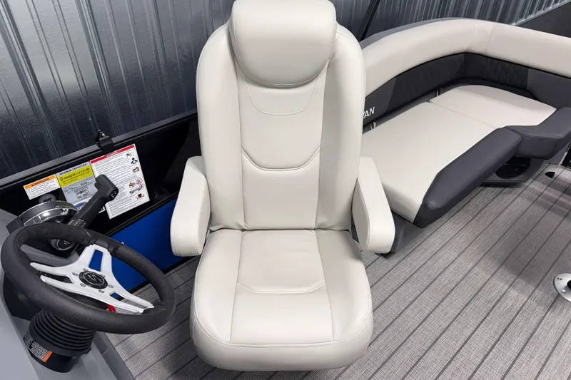 Slide: The Image of Captain's chair and seating area in 2026 Sylvan R-20 LZ DH boat interior. - 9