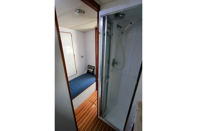 Slide: The Image of Enclosed shower looking out to companionway. - 29