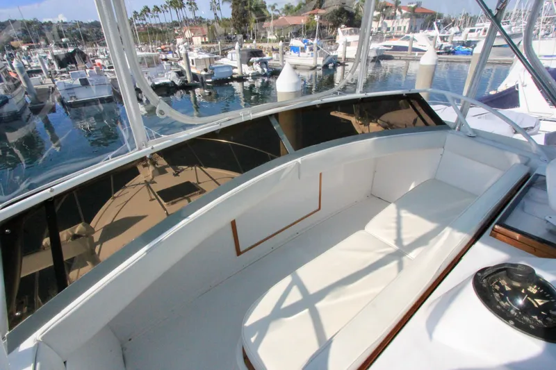 Slide: The Image of Tournament seating on flybridge forward of helm. - 35