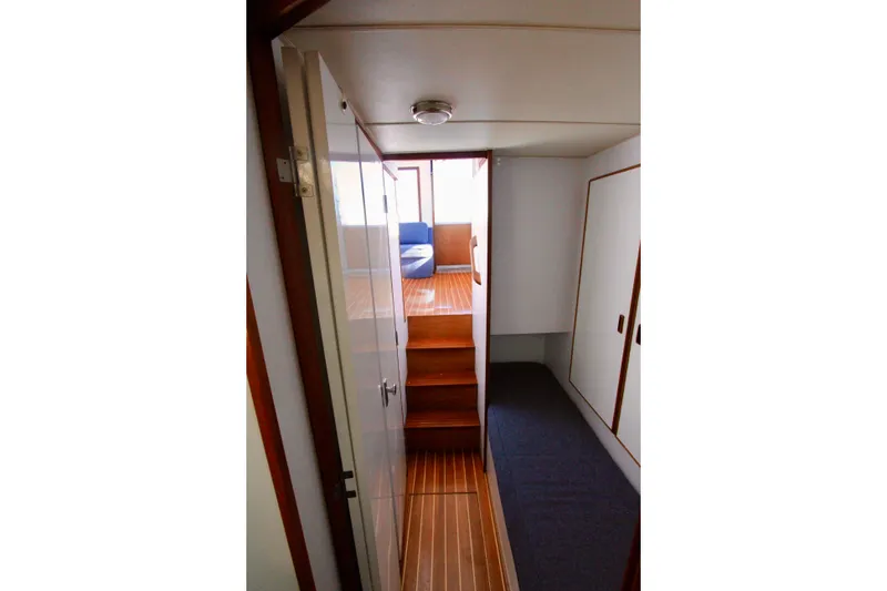 Slide: The Image of v-berth looking aft down companionway. - 22