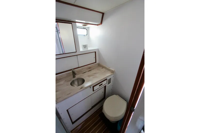 Slide: The Image of Head with Vacuflush toilet. - 27