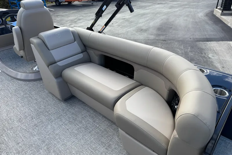 Slide: The Image of 2026 Premier 230 SunSation RF boat with luxurious beige seating and modern design. - 14