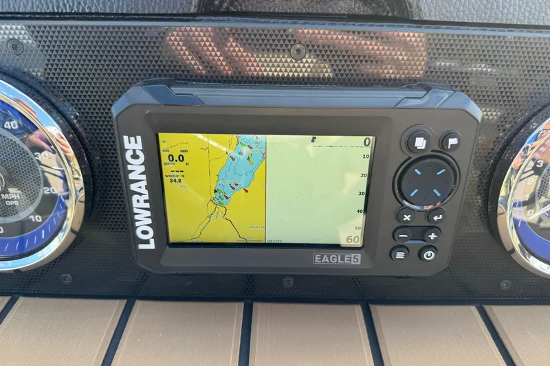 Slide: The Image of Lowrance GPS display on 2026 Premier 230 SunSation RF boat dashboard. - 17