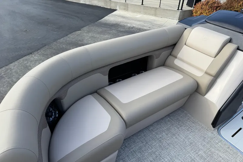 Slide: The Image of Luxurious seating on 2026 Premier 230 SunSation RF pontoon boat, featuring elegant beige upholstery. - 20