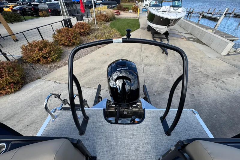 Slide: The Image of 2026 Premier 230 SunSation RF boat with Mercury engine at dockside view. - 23