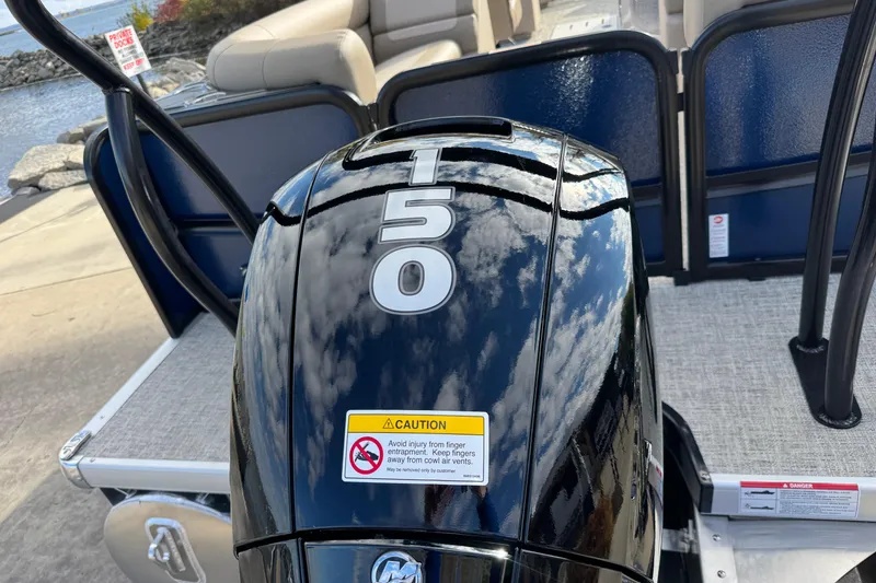 Slide: The Image of 2026 Premier 230 SunSation RF with 150 horsepower engine at a dockside location. - 6