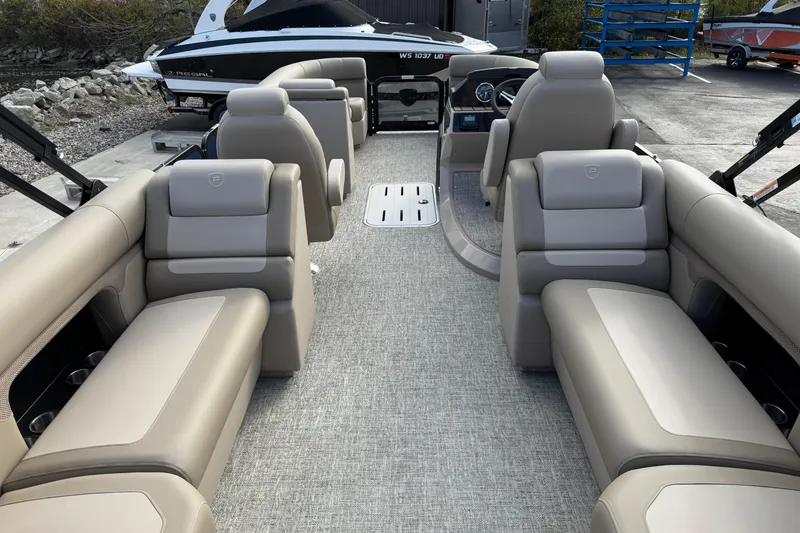 Slide: The Image of Interior of 2026 Premier 230 SunSation RF pontoon boat with luxurious seating. - 7
