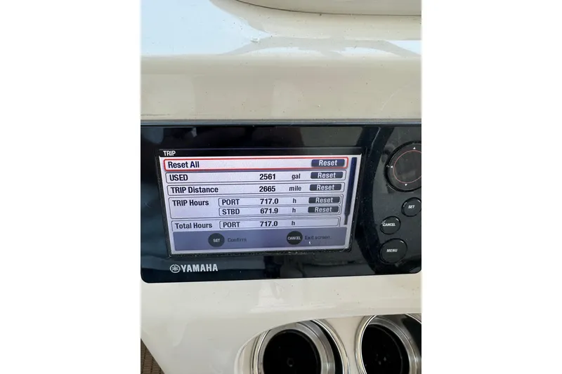 Slide: The Image of Yamaha display on 2017 Grady-White Express 330 showing trip data and reset options. - 13