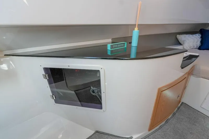 Slide: The Image of Interior of 2025 SeaWell 345XL yacht with modern cabinetry and sleek design. - 12