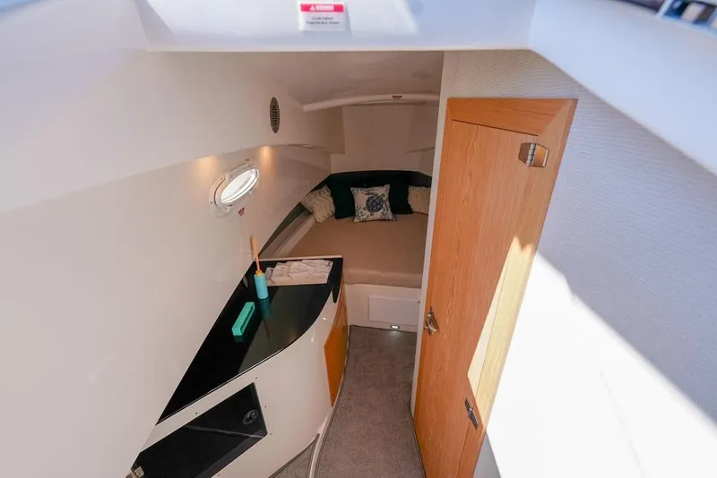 Slide: The Image of Interior cabin of 2025 SeaWell 345XL boat with cozy bed and modern amenities. - 13