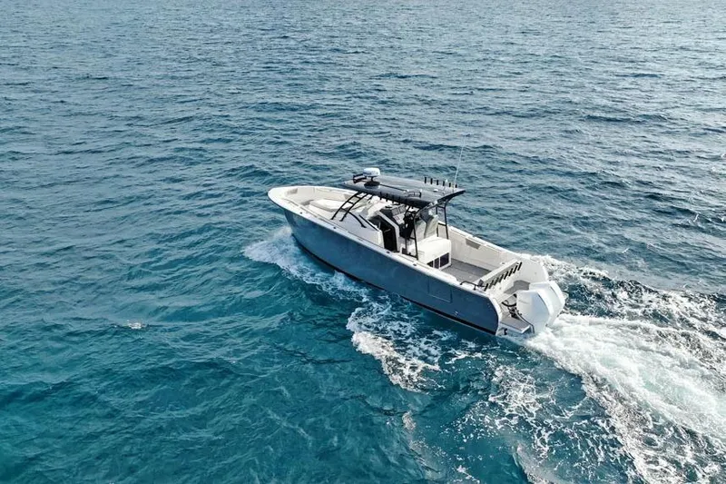 Slide: The Image of SeaWell 345XL boat cruising on open ocean, 2025 model. - 2