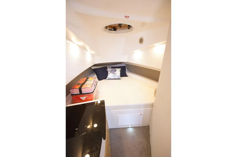 Slide: The Image of Cozy cabin interior of 2025 SeaWell 345XL boat with bed and cushions. - 21