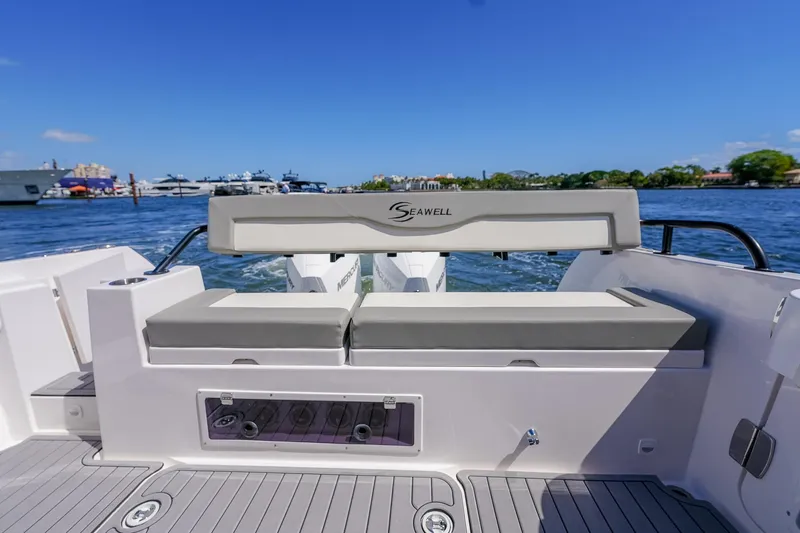Slide: The Image of Sleek SeaWell 345XL boat interior with comfortable seating, cruising on a sunny day, 2025 model. - 25