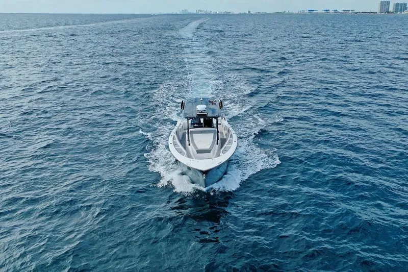 Slide: The Image of SeaWell 345XL boat cruising on open ocean, 2025 model. - 6