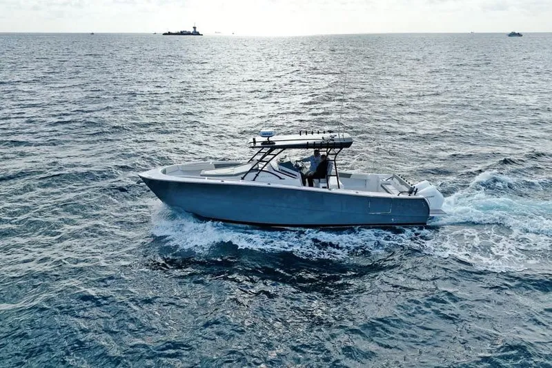 Slide: The Image of 2025 SeaWell 345XL boat cruising on open ocean waters. - 7